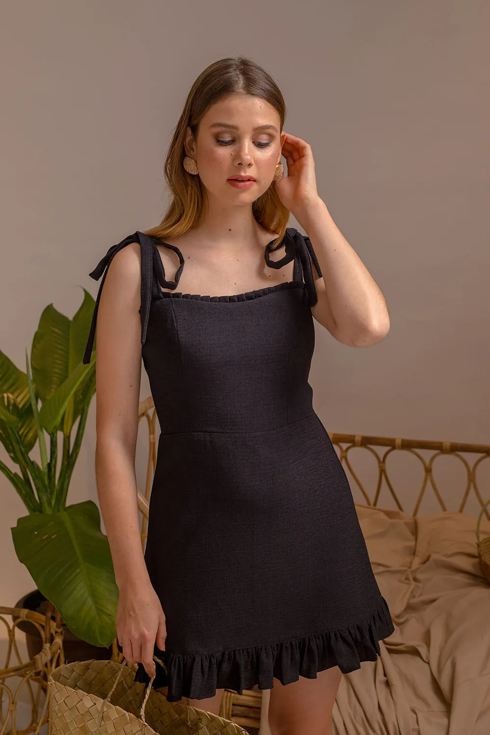 LUMINOSA Mini Dress with Bow Straps and Ruffled Skirt (Black Linen)