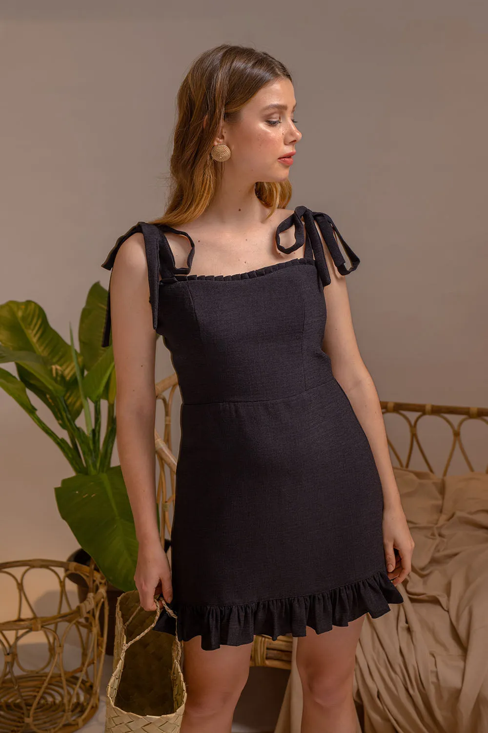 LUMINOSA Mini Dress with Bow Straps and Ruffled Skirt (Black Linen)