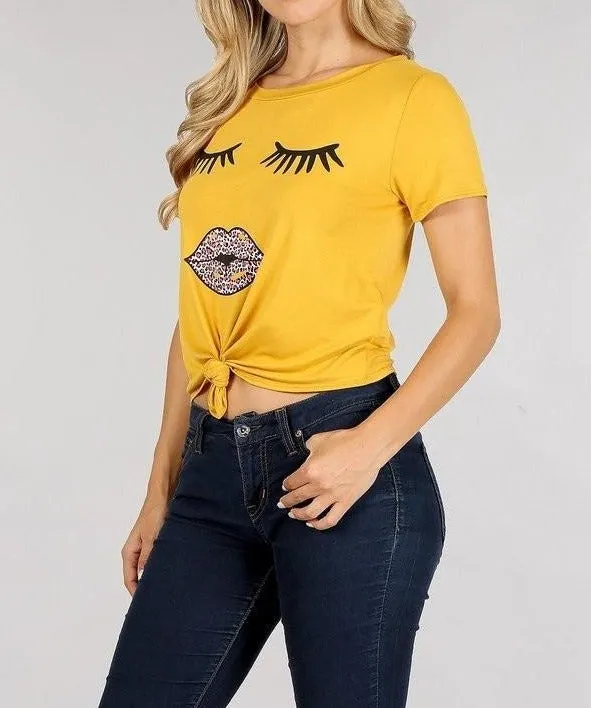 Solid short sleeve cropped tee with a round neckline