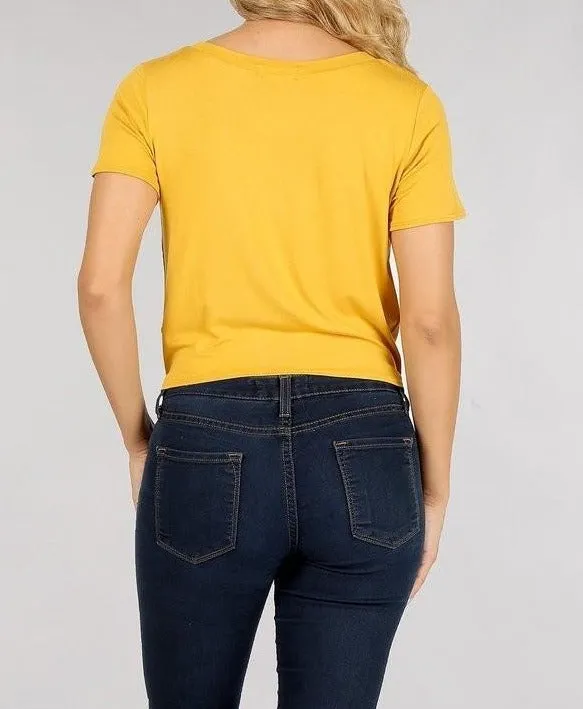 Solid short sleeve cropped tee with a round neckline