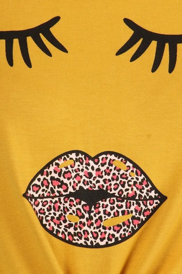 Solid short sleeve cropped tee with a round neckline