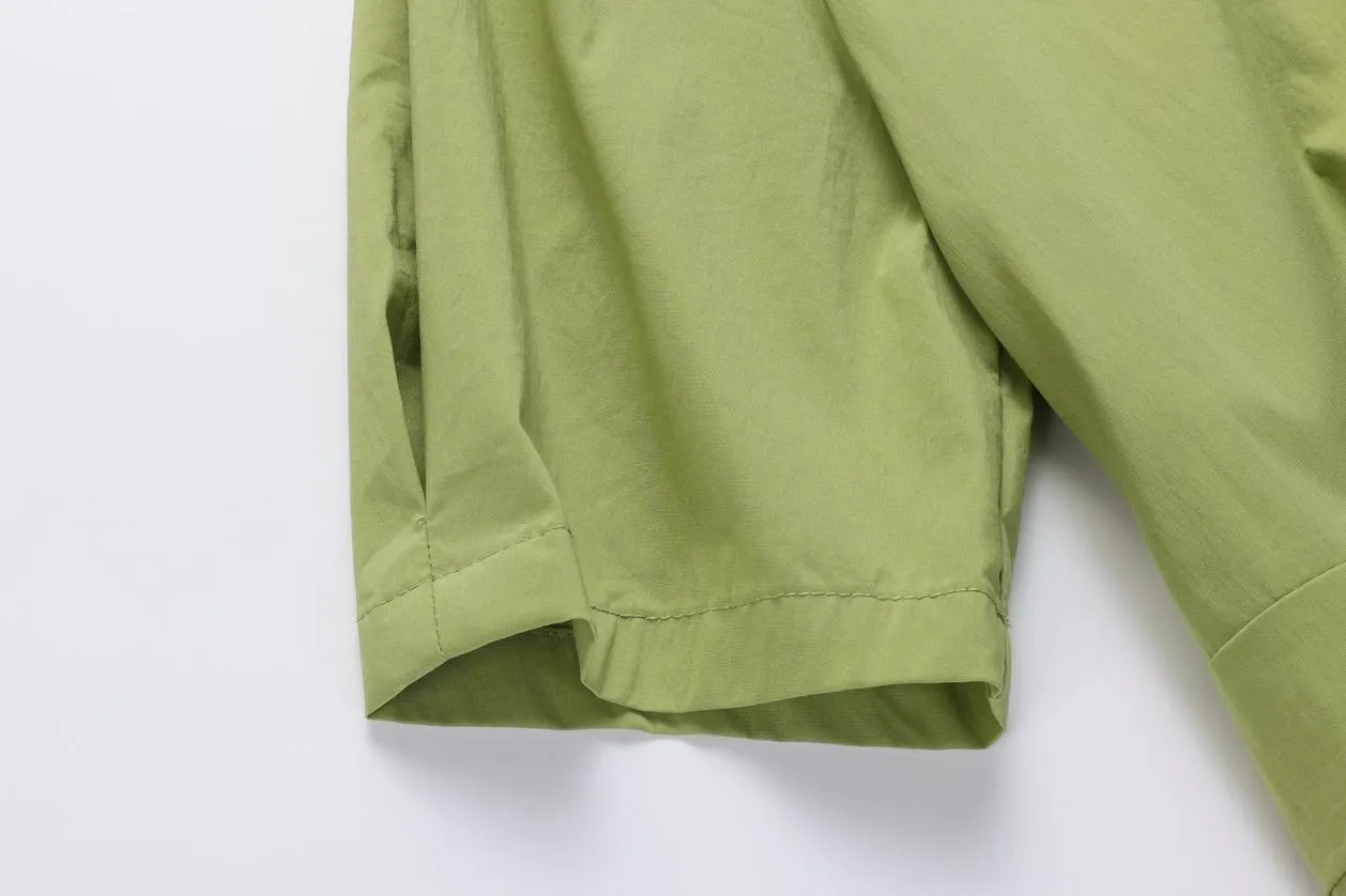 Sweet French-style dress featuring button decoration and a fitted waist