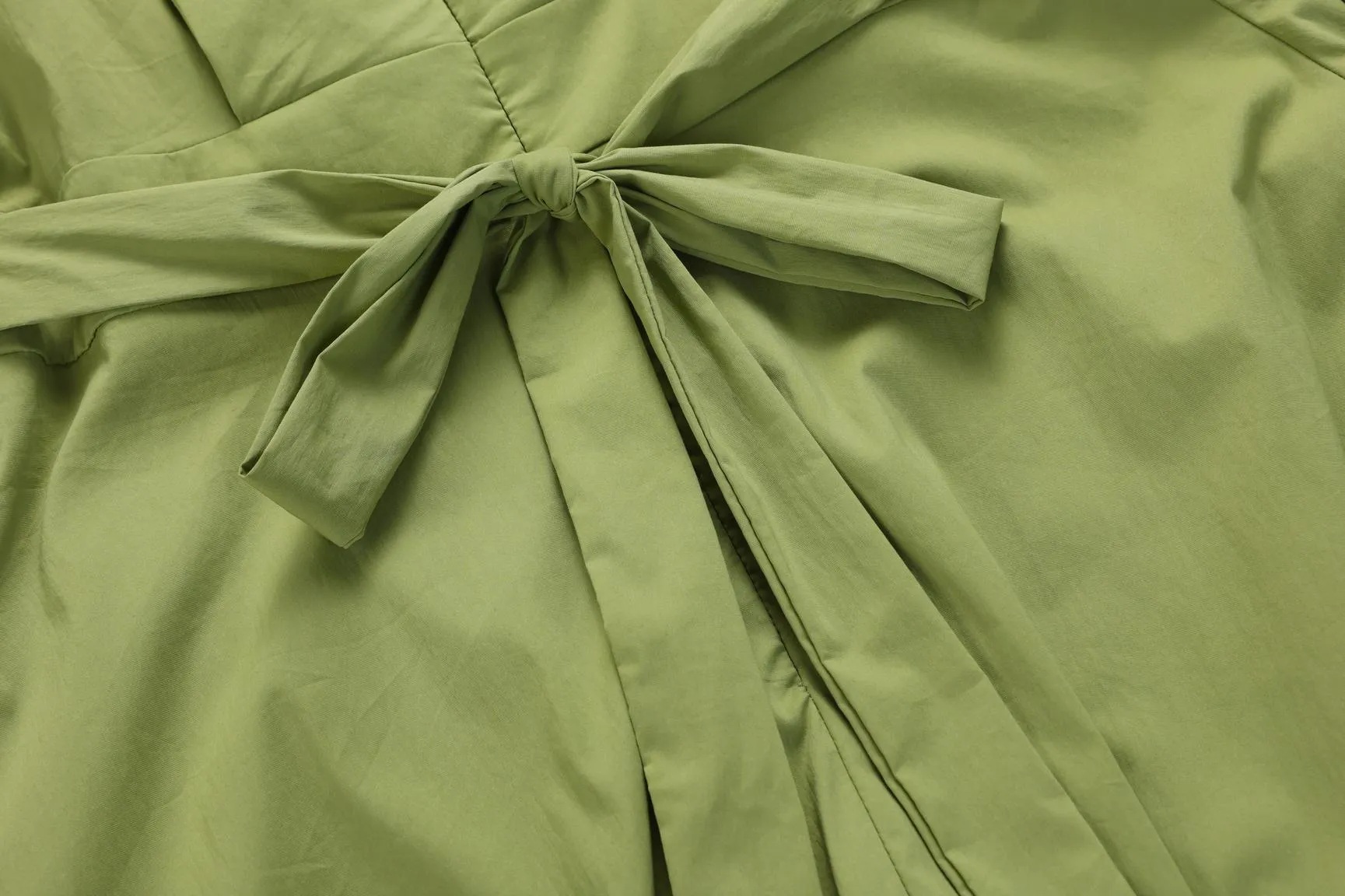Sweet French-style dress featuring button decoration and a fitted waist