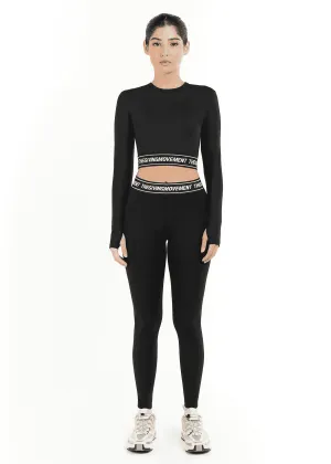 THE GIVING MOVEMENT CROPPED LS TOP WITH BRANDED ELASTIC
