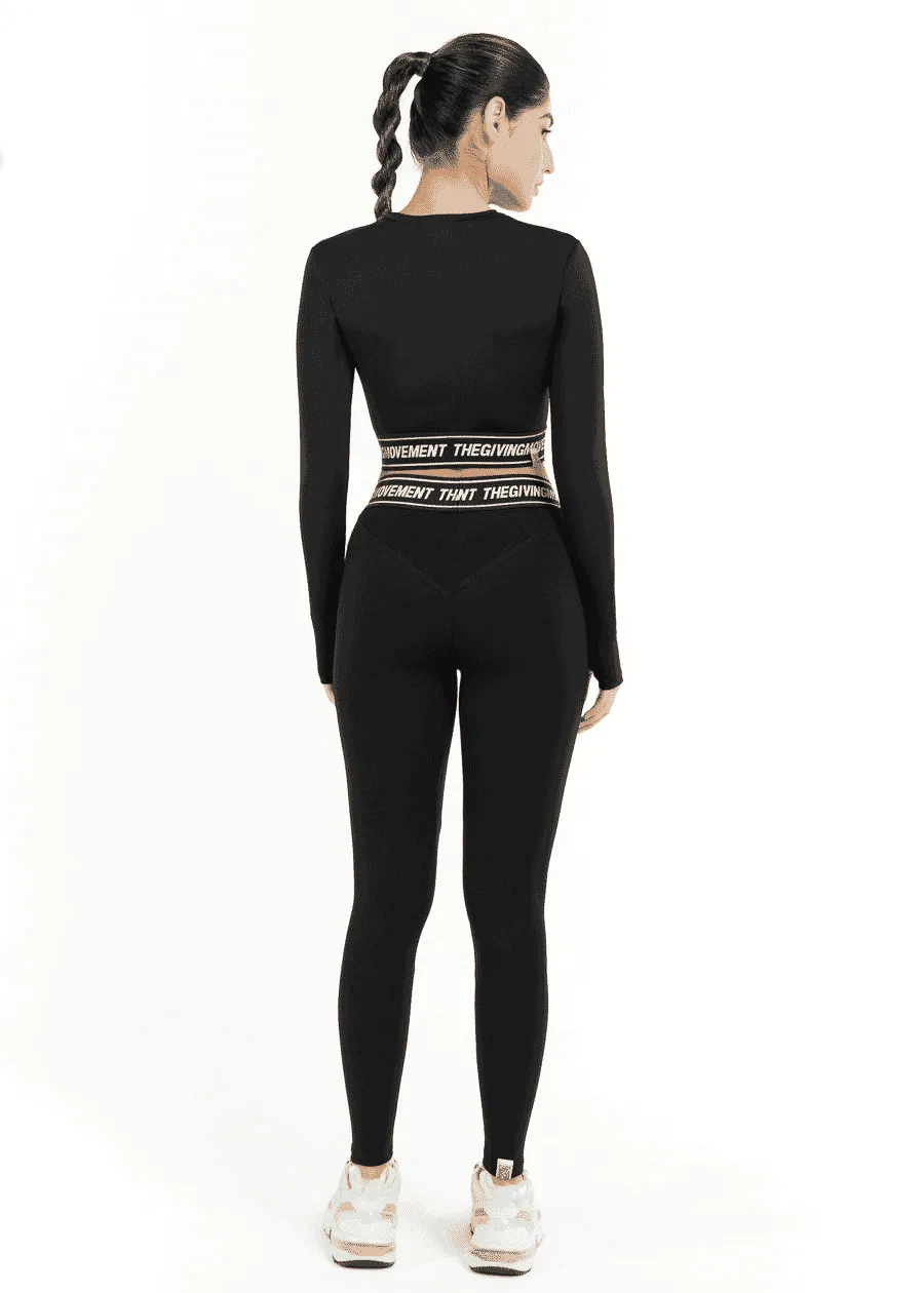 THE GIVING MOVEMENT CROPPED LS TOP WITH BRANDED ELASTIC