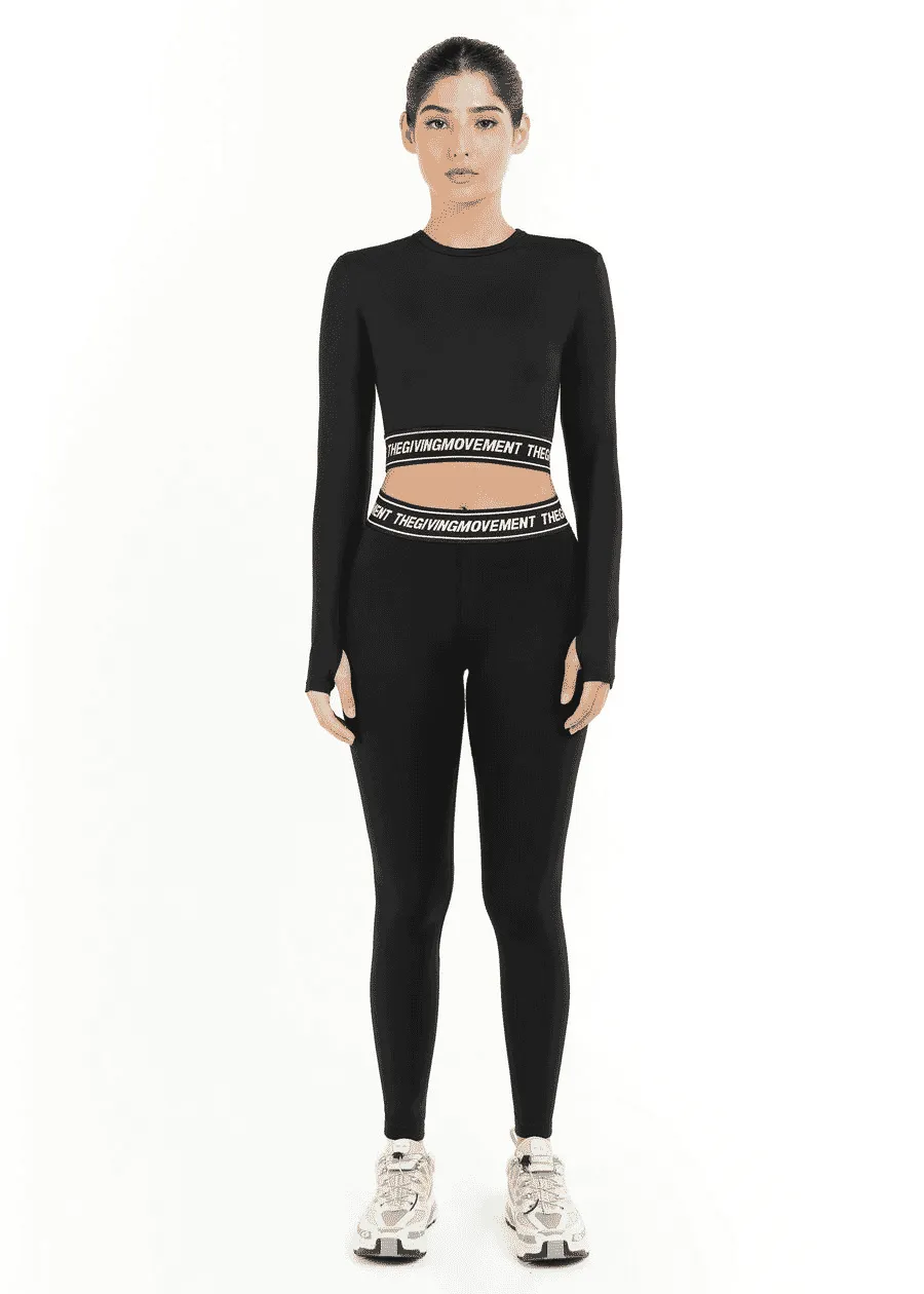 THE GIVING MOVEMENT CROPPED LS TOP WITH BRANDED ELASTIC